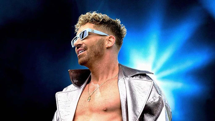 Bobby Newberry wearing silver Laurent Long Coat by ORTTU