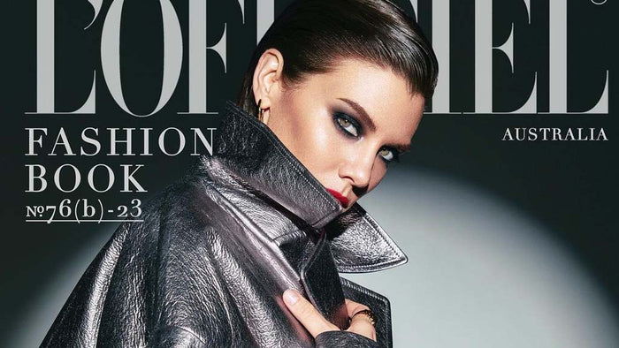 Actress Lauren Cohan wearing silver metallic tench coat by ORTTU